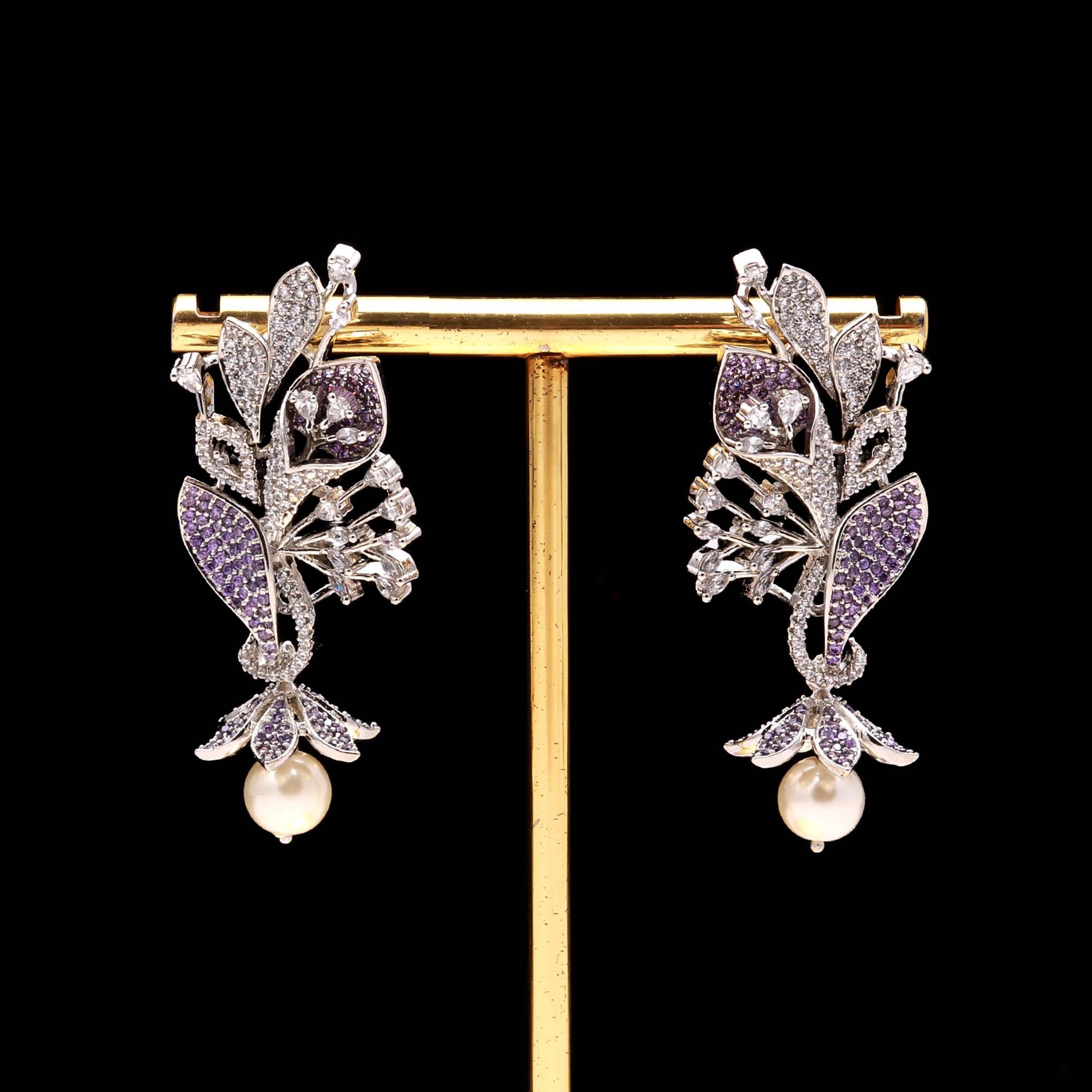 Luxury Black and White American Diamond (AD) Floral Pearl Dangler Earrings - Haamsi