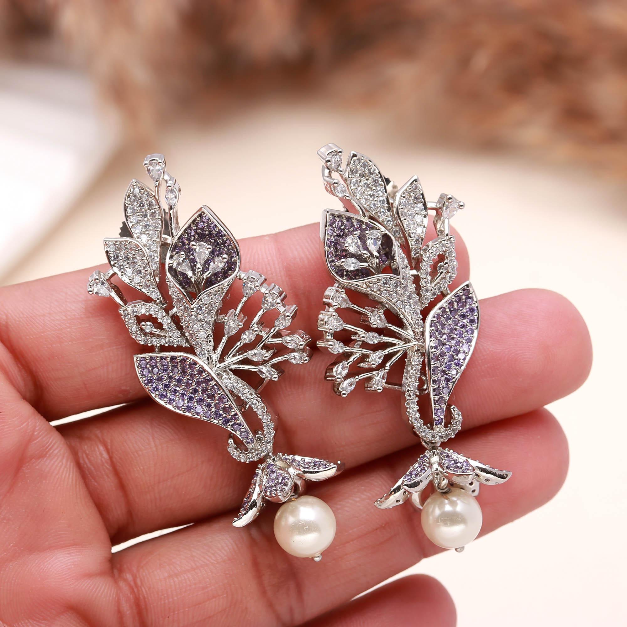 Luxury Black and White American Diamond (AD) Floral Pearl Dangler Earrings - Haamsi