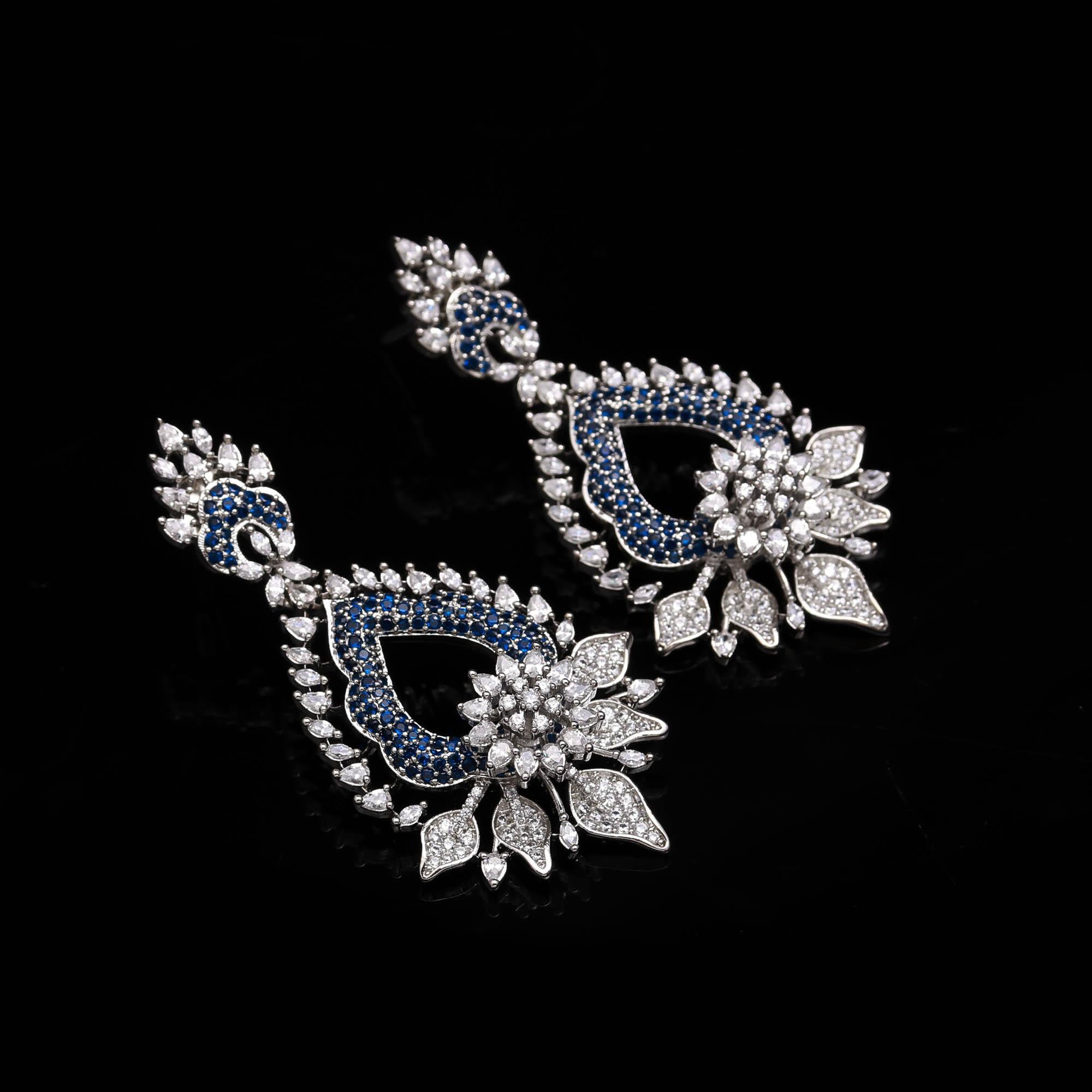 Magnificent Sapphire Blue and White American Diamond (AD) Heart-Shaped Dangler Earrings | Luxury Floral Statement - Haamsi