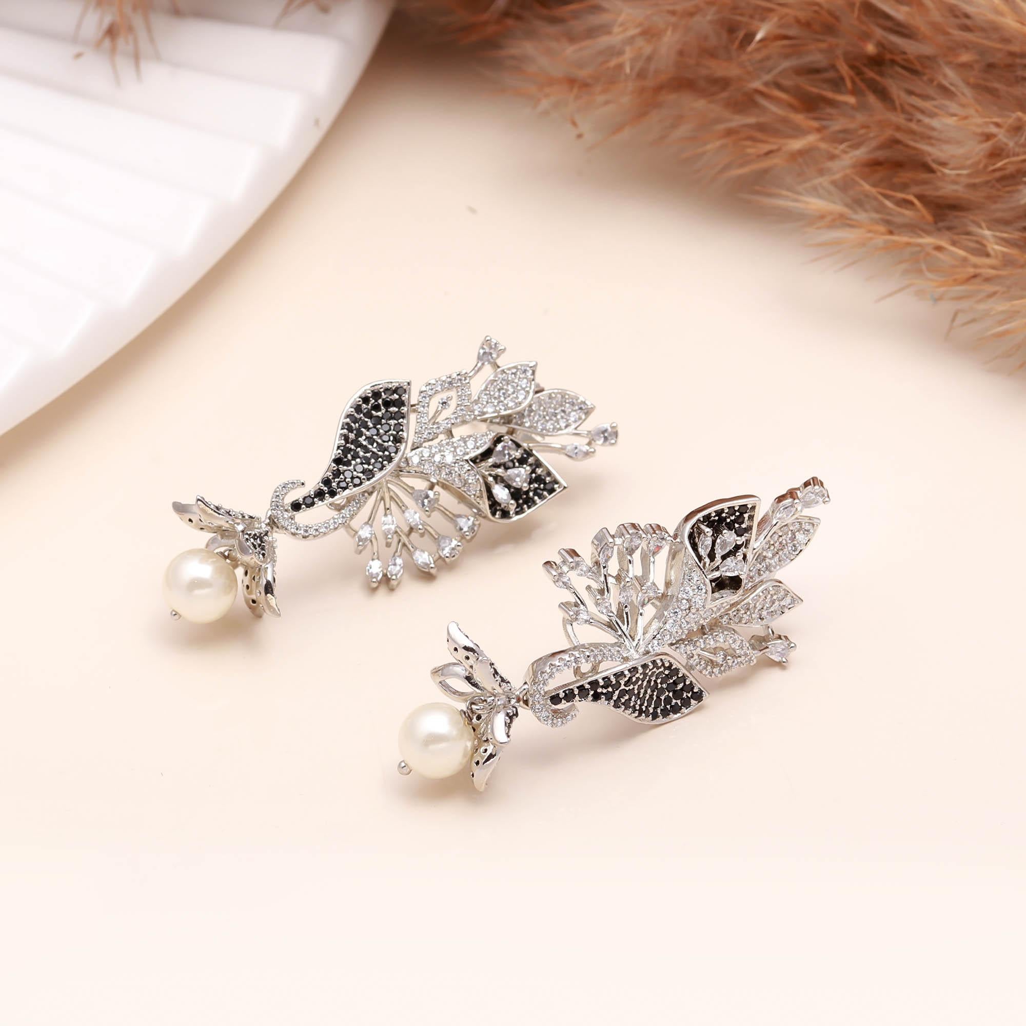 Luxury Black and White American Diamond (AD) Floral Pearl Dangler Earrings - Haamsi
