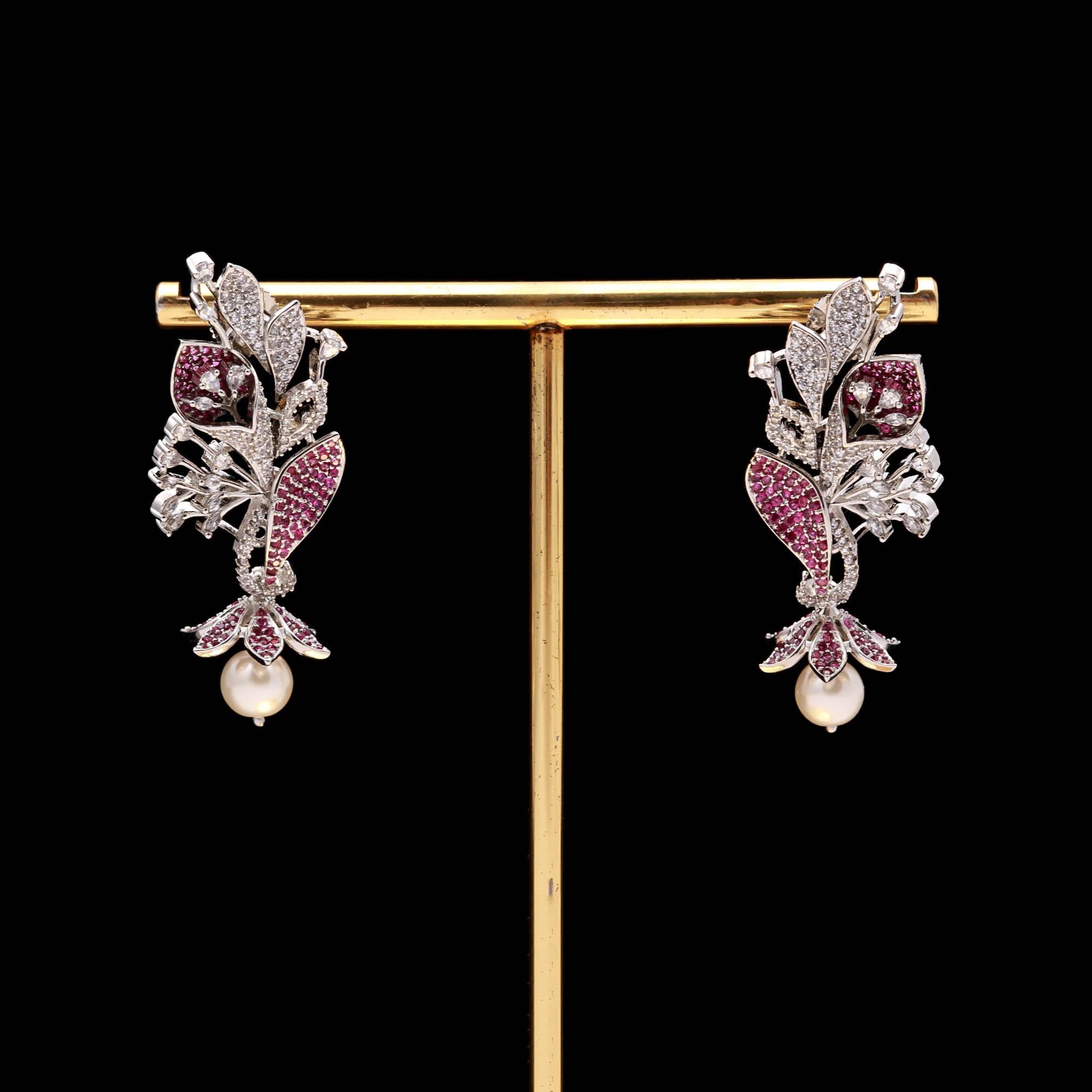 Luxury Black and White American Diamond (AD) Floral Pearl Dangler Earrings - Haamsi