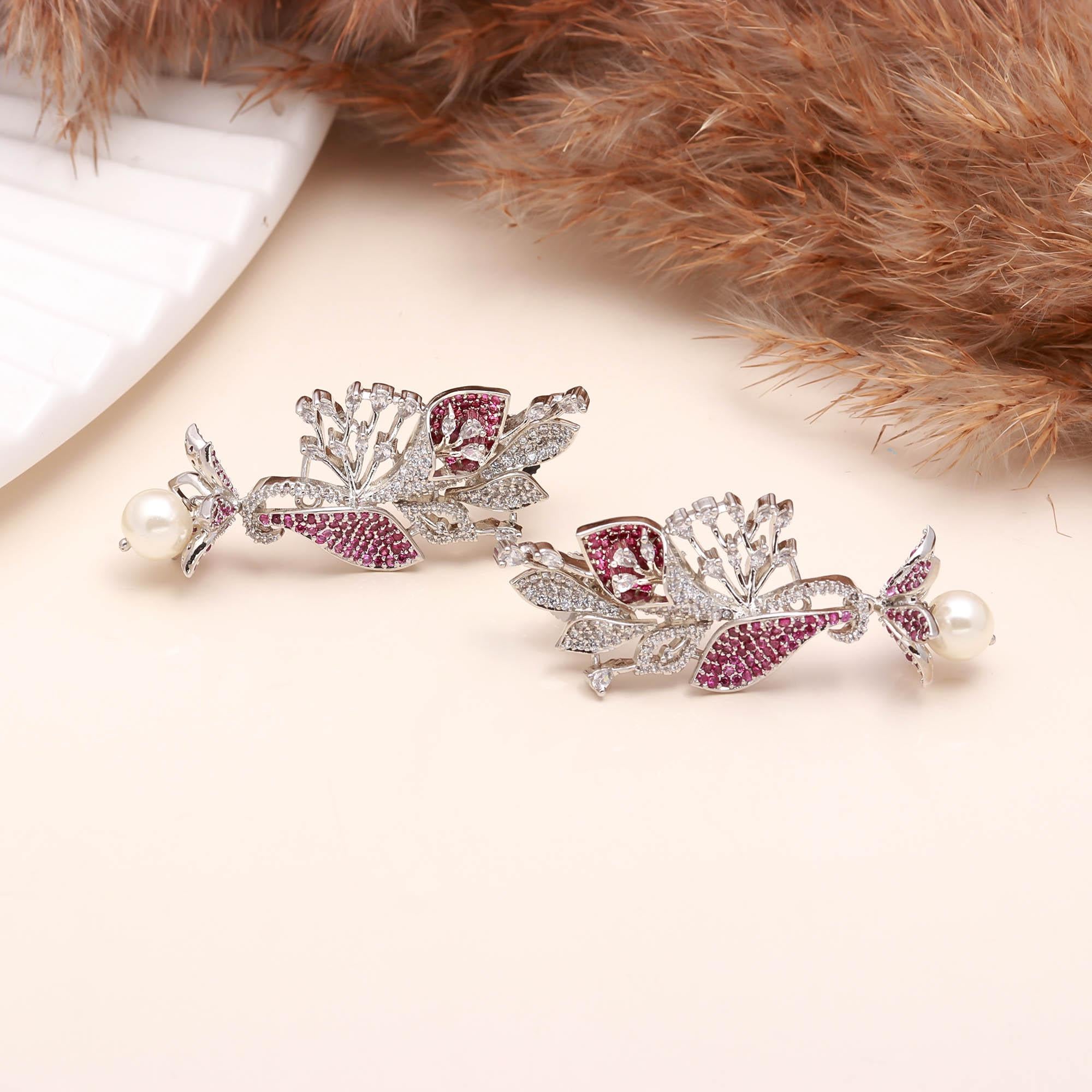 Luxury Black and White American Diamond (AD) Floral Pearl Dangler Earrings - Haamsi