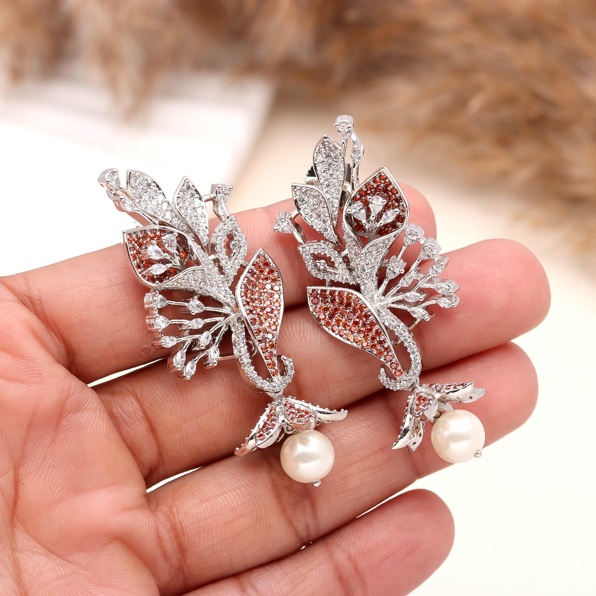 Luxury Black and White American Diamond (AD) Floral Pearl Dangler Earrings - Haamsi