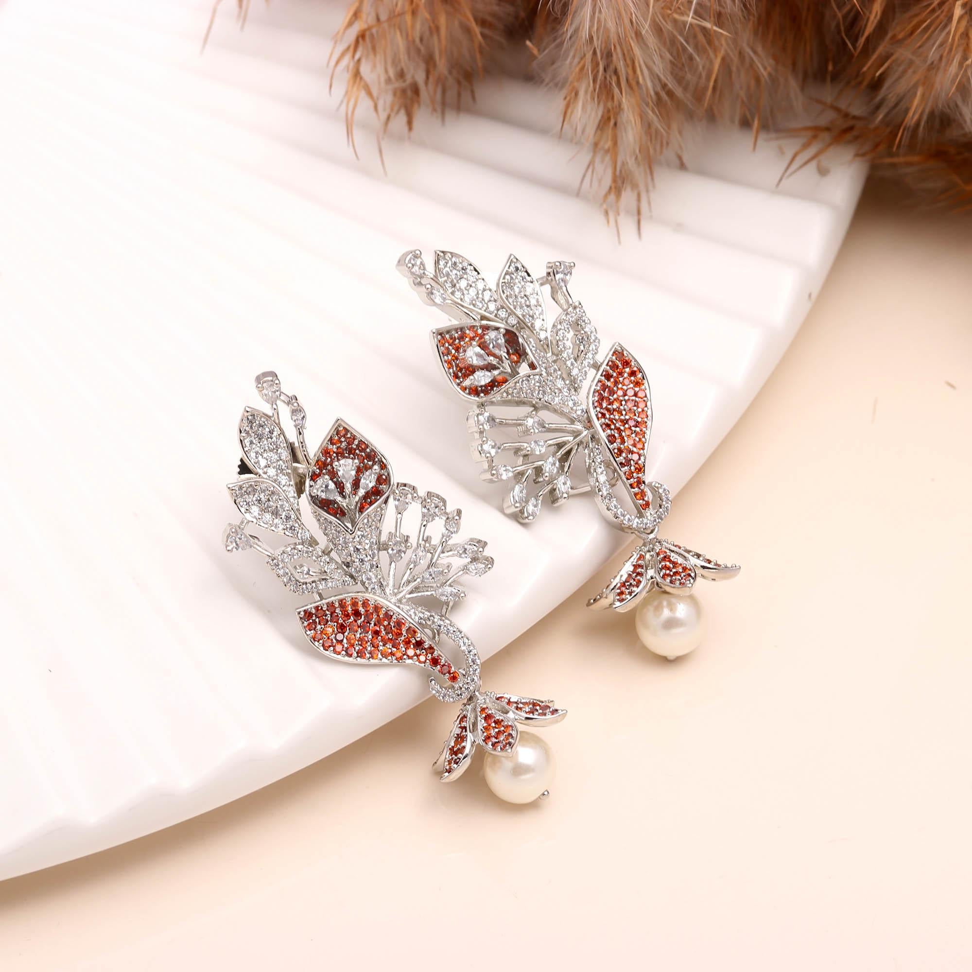 Luxury Black and White American Diamond (AD) Floral Pearl Dangler Earrings - Haamsi